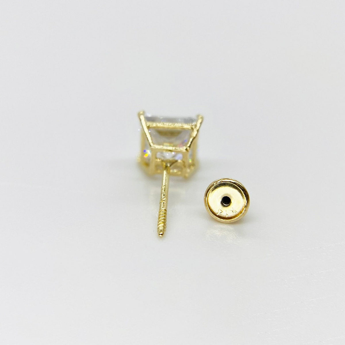 Back view of a square CZ stud earring showing the threaded post and backing.