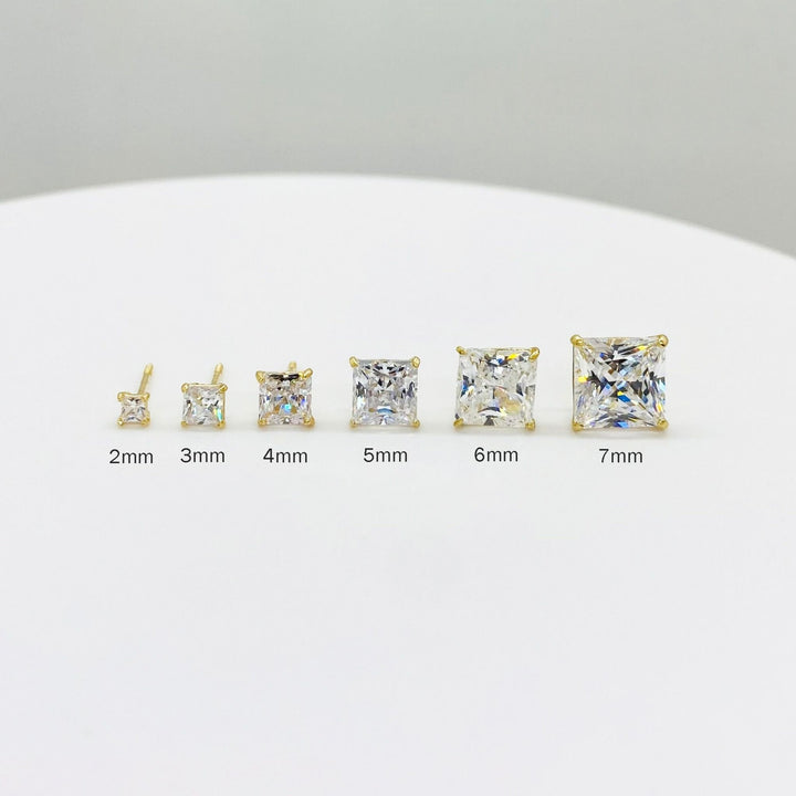 Size comparison of 14k gold square CZ stud earrings ranging from 2mm to 7mm.