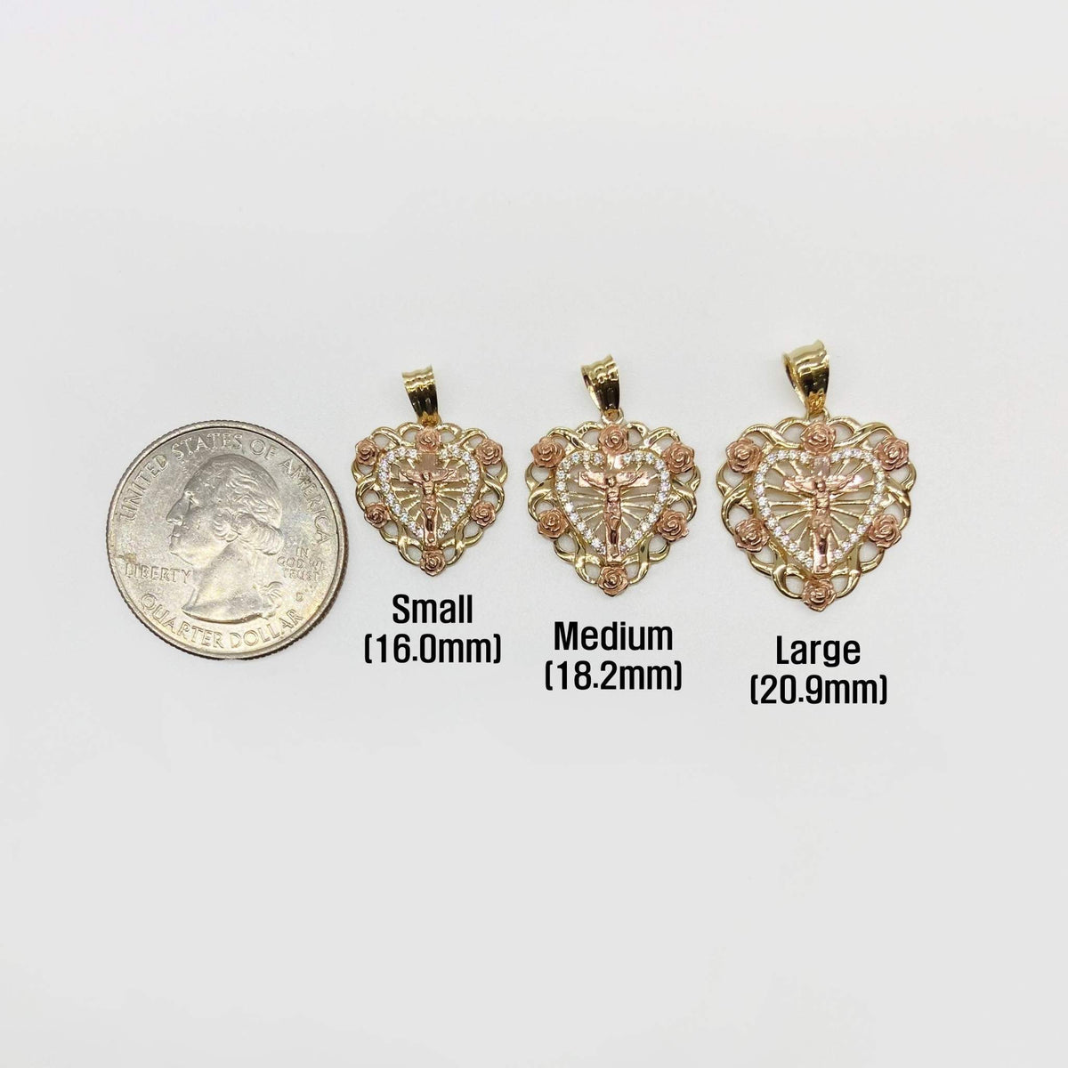 14k gold crucifix bloom rose heart pendants shown in Small, Medium, and Large sizes.