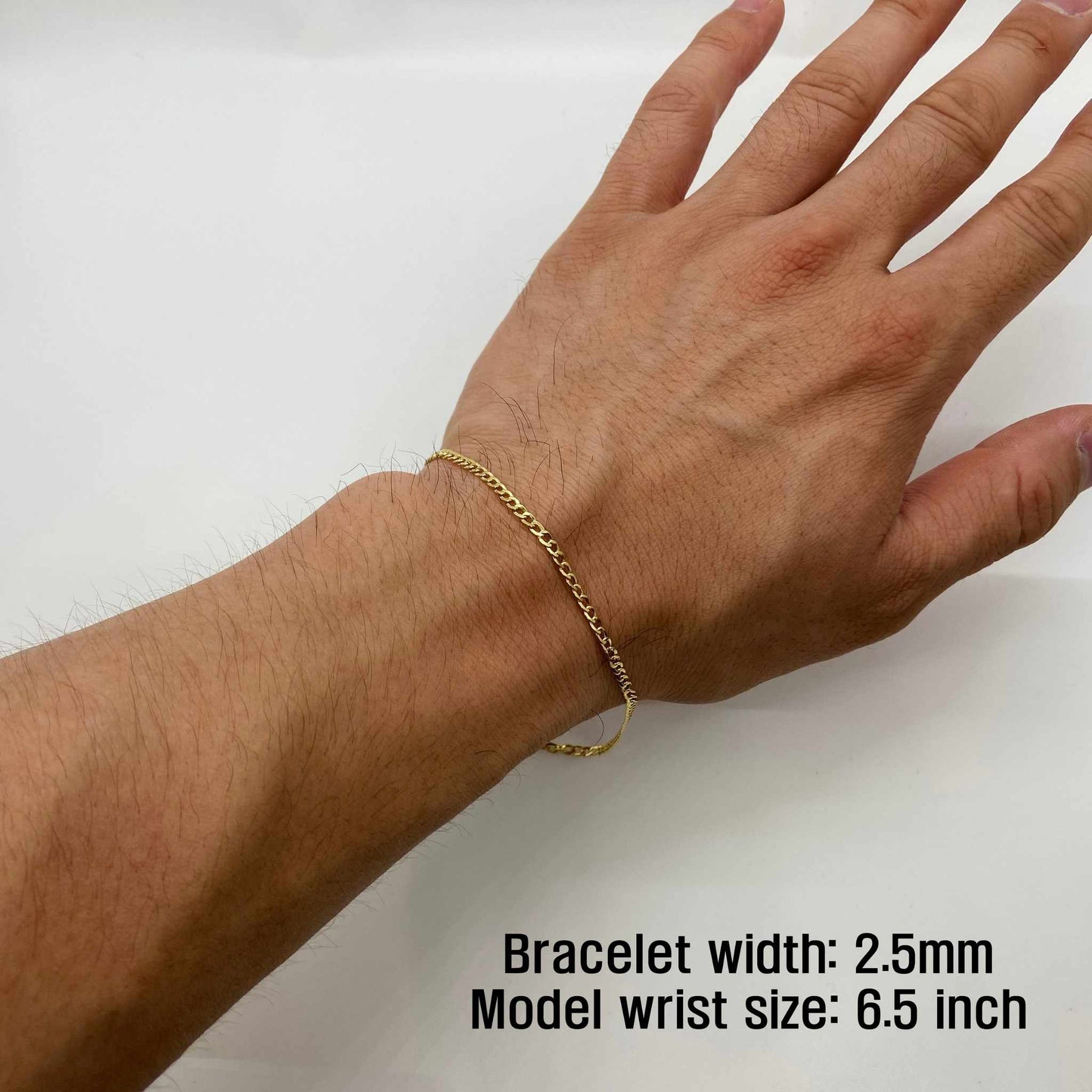 14k Gold Cuban Bracelet on a wrist with text indicating width and model wrist size.