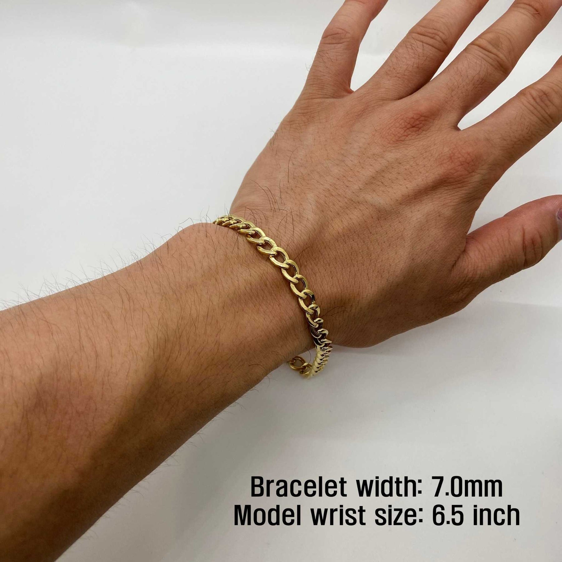 14k Gold Cuban Braceleton a wrist with text indicating width size