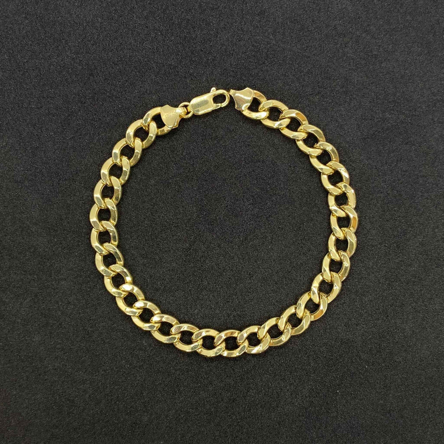 14k Gold Cuban Curb Link Bracelet Anklet on a black backgound