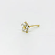 14k gold flower nose stud with clear cubic zirconia petals on plain white background.