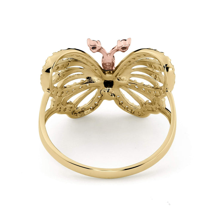 Back view of 14k gold genie butterfly two-tone CZ ring showing inner band.