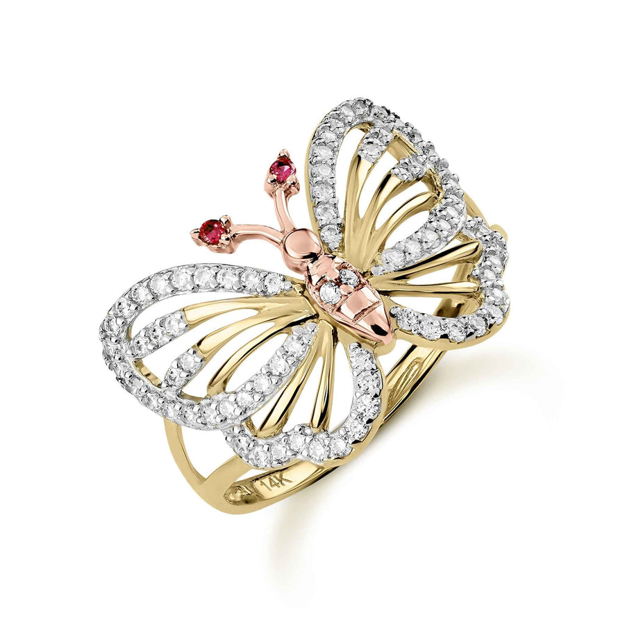 Two-tone gold butterfly ring featuring pave cubic zirconia wings and vibrant red eyes.