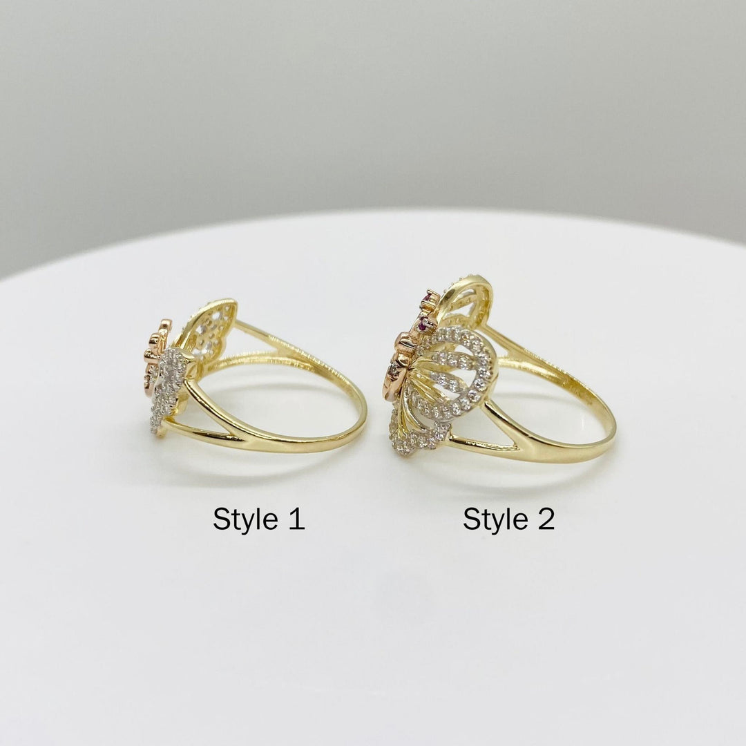 Two 14k gold butterfly rings side view labeled Style 1 and Style 2 on a white background