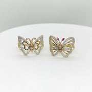 two 14k Butterfly shaped rings with Cubic Zirconia on a white background