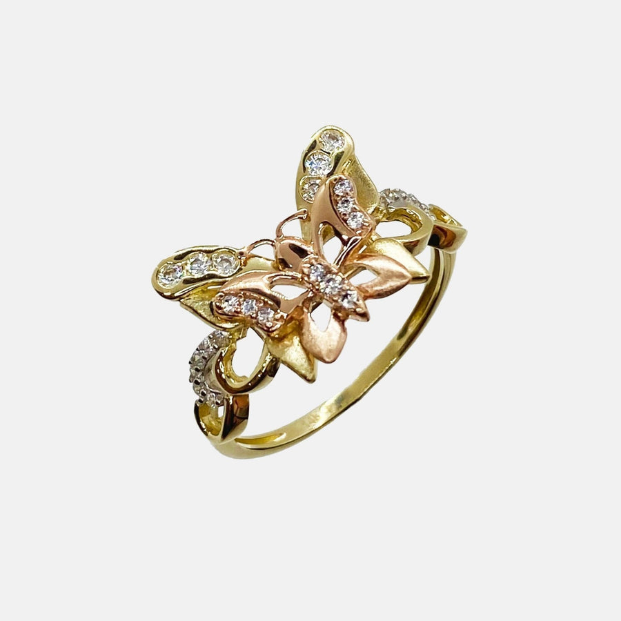 14k Gold ring with butterfly design and Cubic Zirconia on a white background