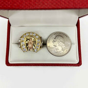 14k Gold Horseshoe Virgin Mary next to a U.S. quarter for reference in a red jewelry box