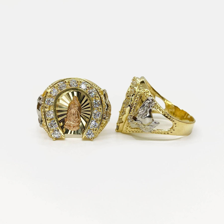 Two 14k gold rings with religious design front and side view on a white background