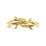 Front view of 14k gold Kari dual dolphin ring on white background.