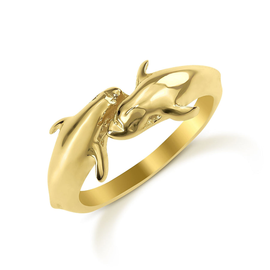 Angled view of 14k gold Kari dual dolphin ring on a white background.