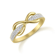 A 14k gold infinity-shaped ring studded with glittering cubic zirconia on a white background