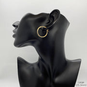 Large 25.3mm 14k gold hoop earring featuring a 2mm tube and matte finish.