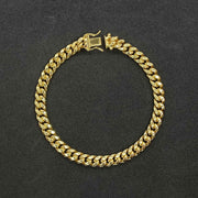 Exquisite 14k gold Miami Cuban bracelet showcasing a timeless, high-shine interlocking link design.