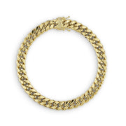 14k gold hollow Miami Cuban chain bracelet with a polished finish and box lock clasp.