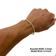4.5mm 14k gold Miami Cuban chain bracelet on a 6.5 inch model wrist.