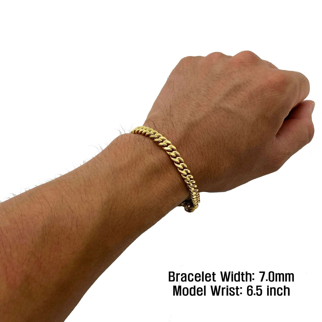 7.0mm 14k gold Miami Cuban chain bracelet on a 6.5 inch model wrist.
