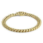 14k gold Miami Cuban link chain bracelet with a polished finish.