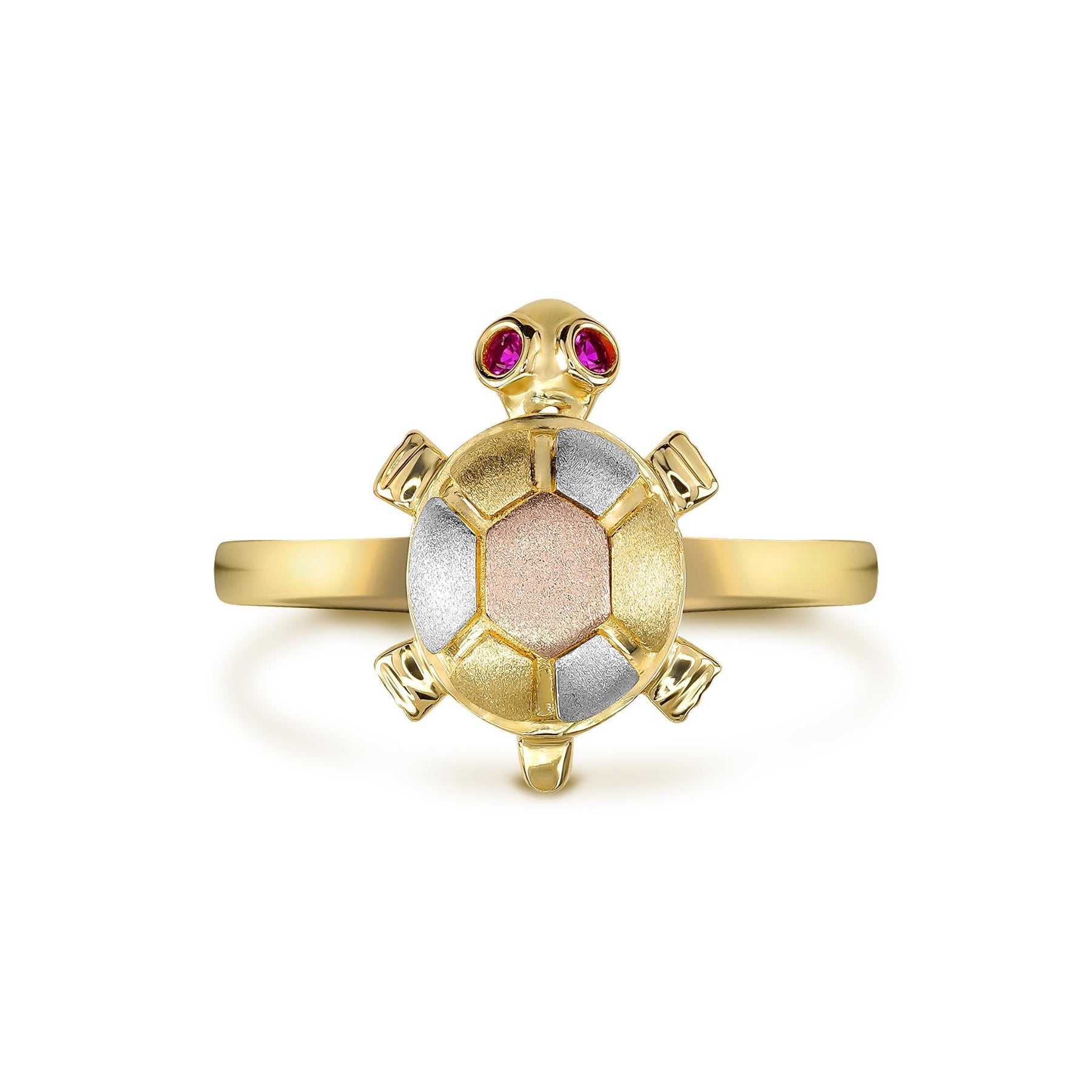 Tri-color gold turtle ring with pink gemstone eyes standing upright on a white background.