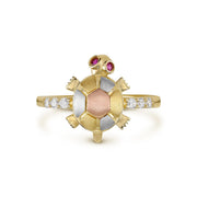 Front view of a 14k tri-color gold turtle ring accented with cubic zirconia.
