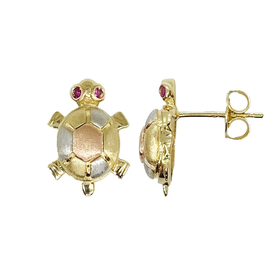 Front and side view of 14k gold tri-color turtle stud earrings with red cubic zirconia eyes.