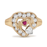 Gold heart ring featuring 'MOM' lettering and a pink heart-shaped center stone.