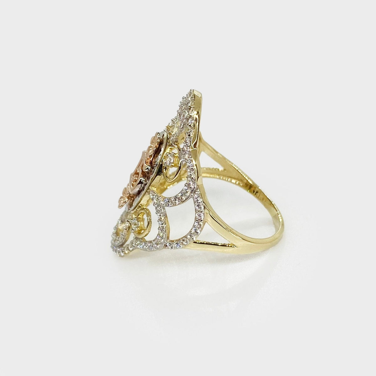 14k Gold Quinceanera ring with floral design sideview on a white background
