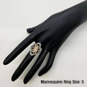 14k gold Quinceanera ring on a black mannequin hand with text indicating ring size 5.