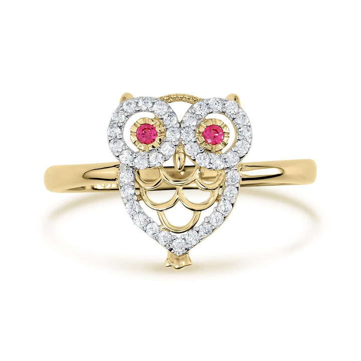 Yellow gold owl ring featuring a heart-shaped body encrusted with white cubic zirconia.
