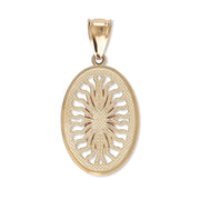 The textured hollow back view of the two-tone gold Guadalupe pendant on white.