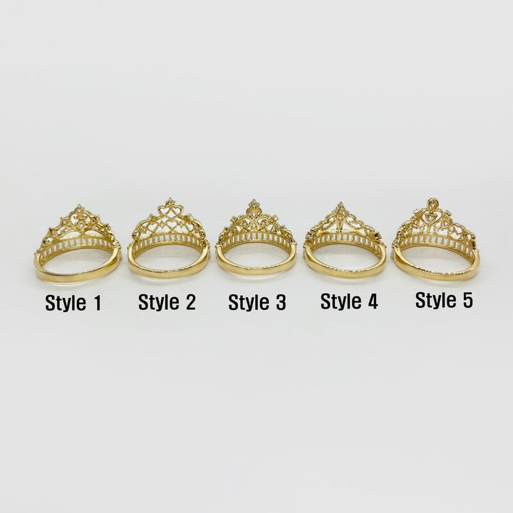 Five 14k gold tiara-style rings back view on a white background