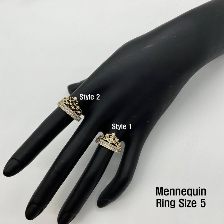 Two 14k gold crown rings on a black mannequin hand with labels for styles and ring size.
