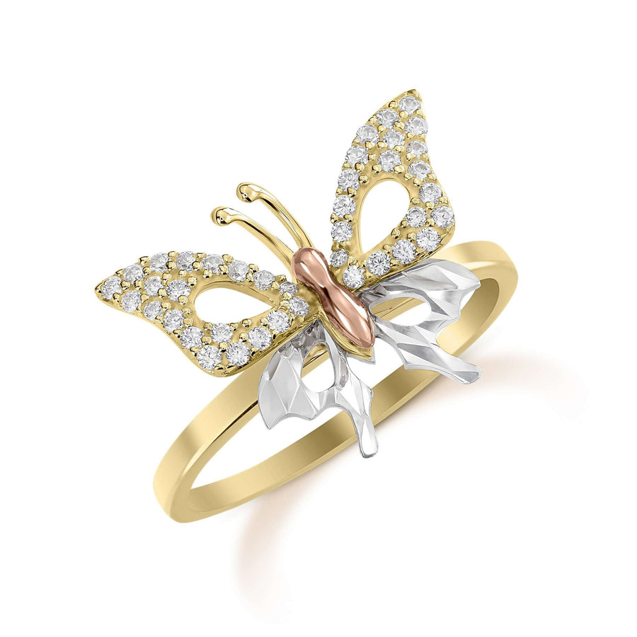 A butterfly-shaped tricolor gold ring studded with sparkling cubic zirconia on a white background.