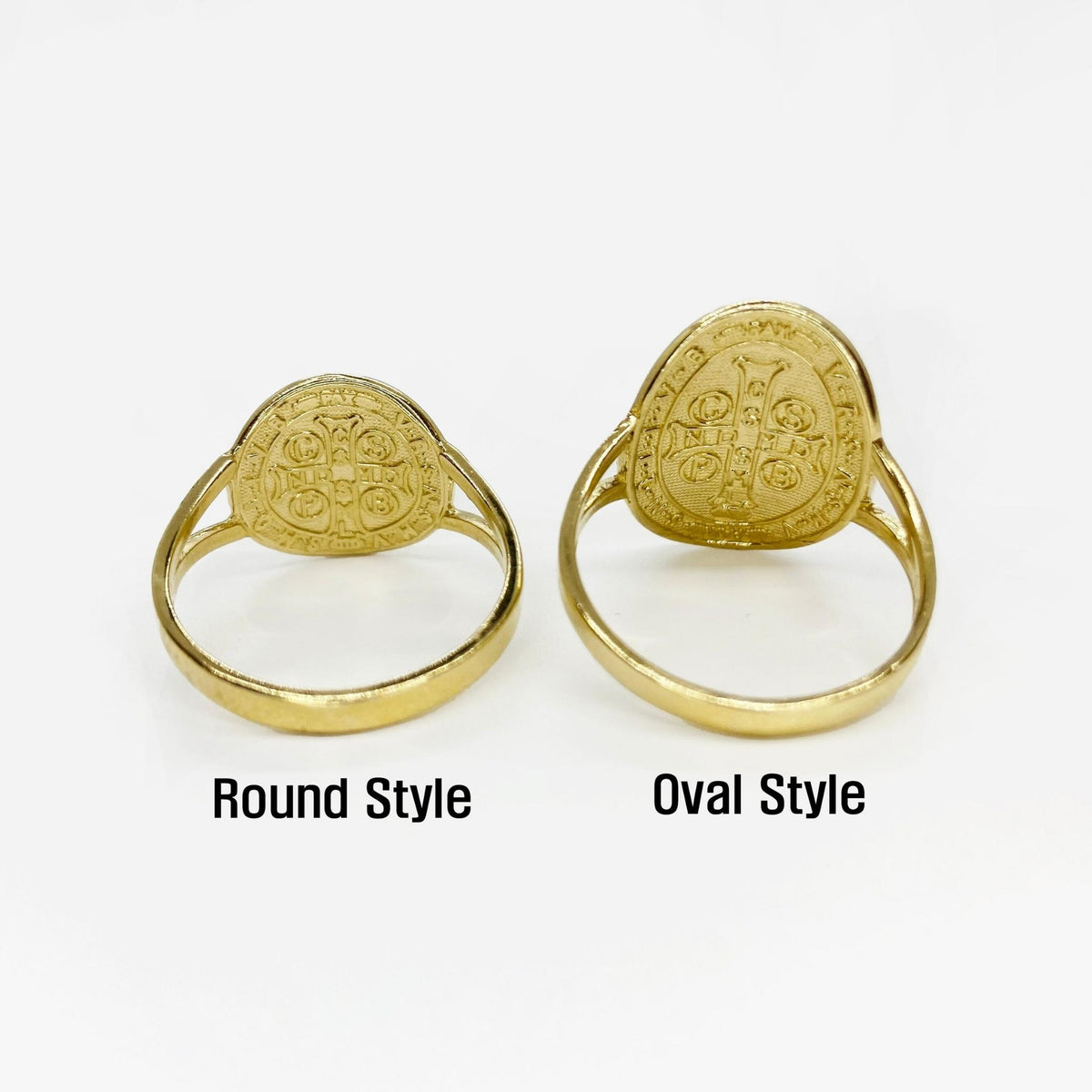 Two 14k gold rings, one round and one oval, back view on a white background.