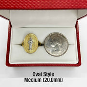 14k gold Saint Benedict round style ring and a silver coin displayed in a red box 