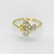 14k Gold ring with fish and sparkling cubic zirconia design on a light gray background