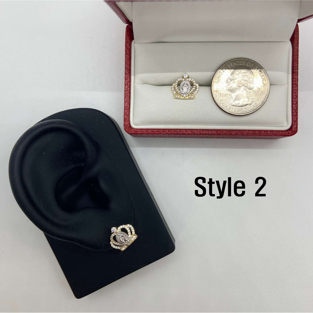 Style 2 14k gold Virgin Mary royal crown stud earring on a display stand with quarter.