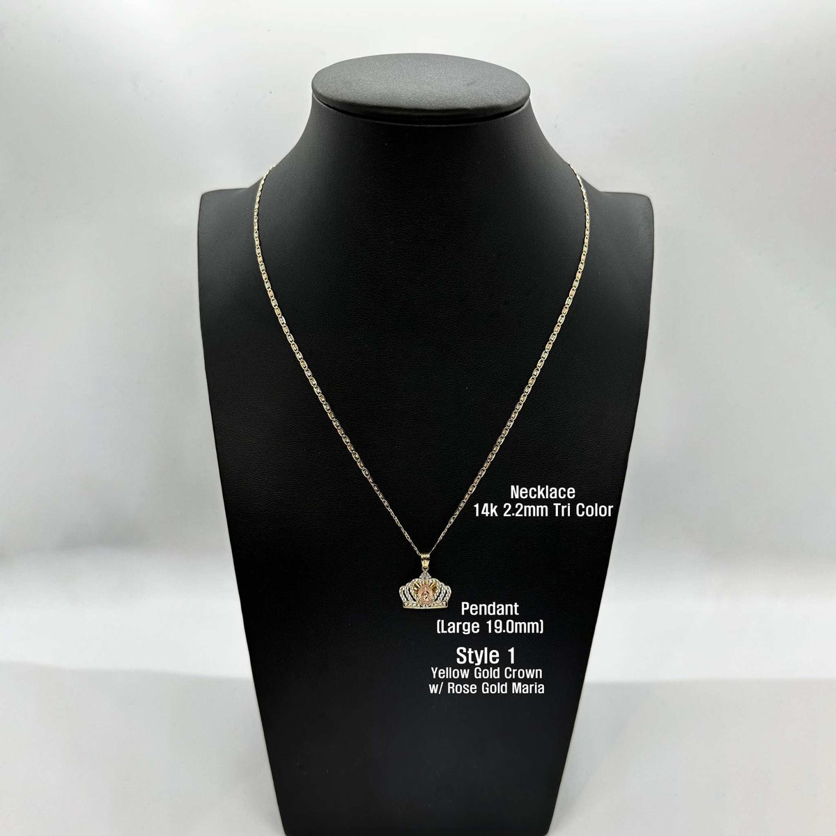Style 1 Large 14k gold Virgin Mary crown pendant shown on a black display bust.