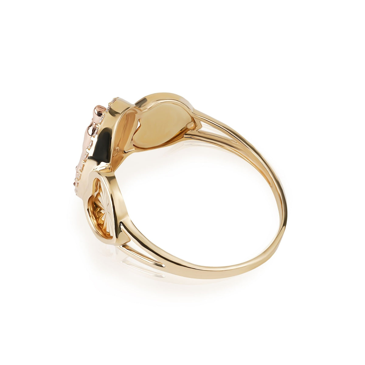 Side-profile of a 14k gold Virgin Mary Guadalupe heart-sided two-tone ring.