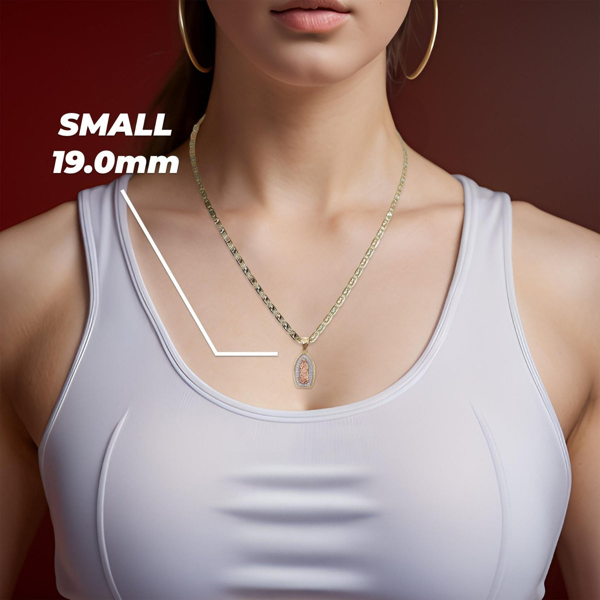 Model wearing Small 19.0mm 14k gold Virgin Mary Guadalupe pendant necklace.