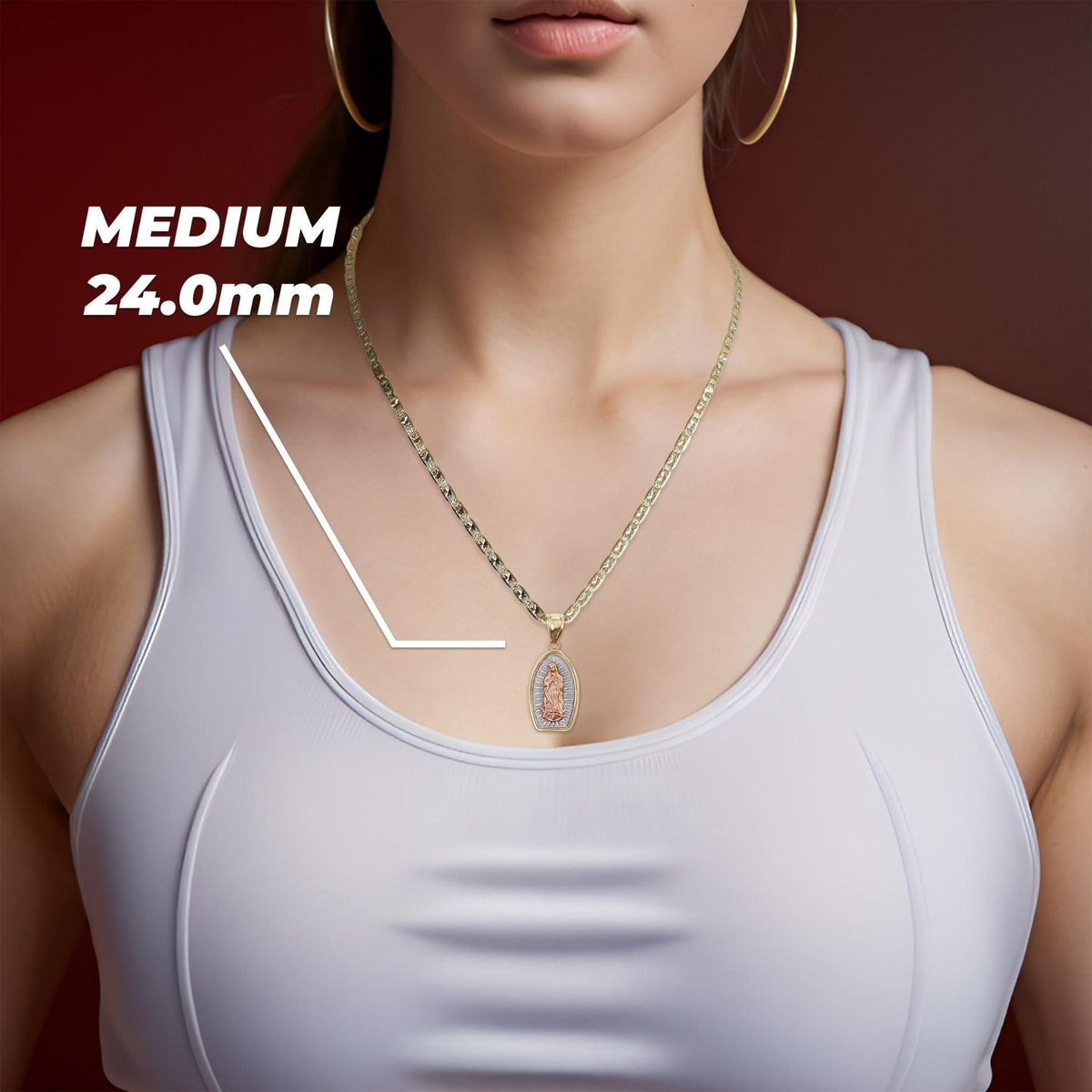 Model wearing Medium 24.0mm 14k gold Virgin Mary Guadalupe pendant necklace.