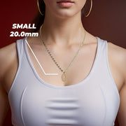 Model wearing Small 20.0mm 14k gold Virgin Mary Guadalupe pendant necklace.