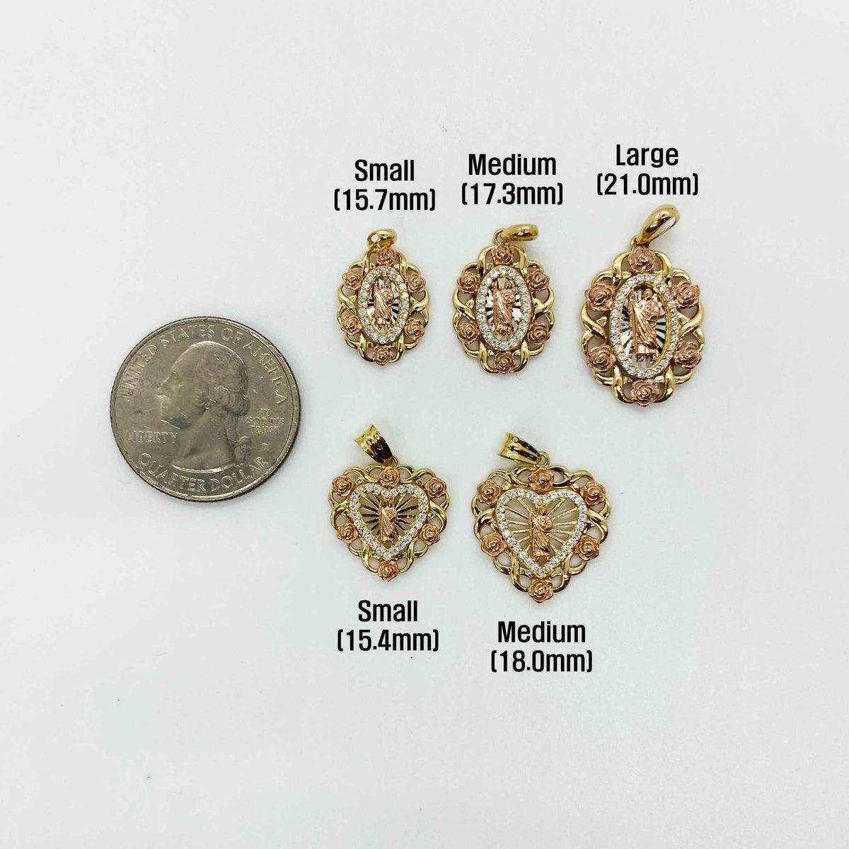 Size comparison of five 14k gold Saint Jude pendants next to a US quarter.
