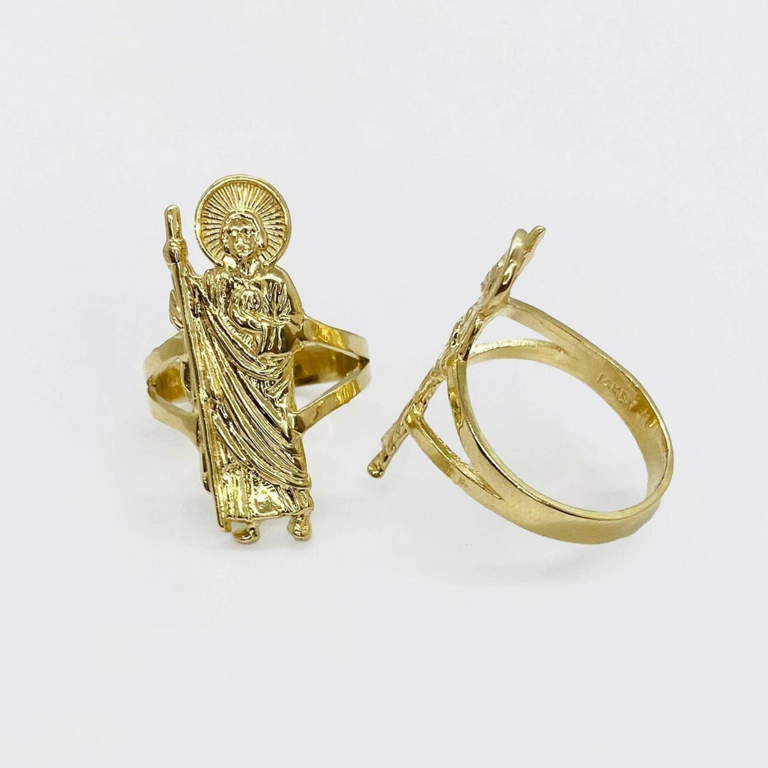 Two 14k gold rings with Saint Jude designs on a white background