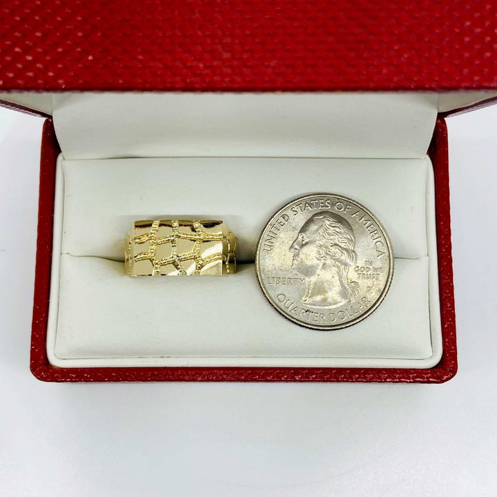 14k Gold nugget ring next to a quarter for reference in an open red jewelry box