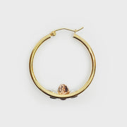 14k gold vintage-style Virgin Mary hoop earring with floral detailing, classic religious jewelry.