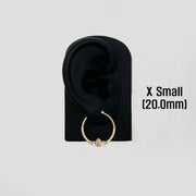 20.0mm 14k gold Virgin Mary hoop earring displayed on a black mannequin ear stand.