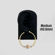 40.0mm 14k gold Virgin Mary hoop earring displayed on a black mannequin ear stand.