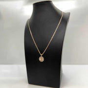 14k gold tri-color Virgin Mary round medallion pendant necklace displayed on a black mannequin bust.